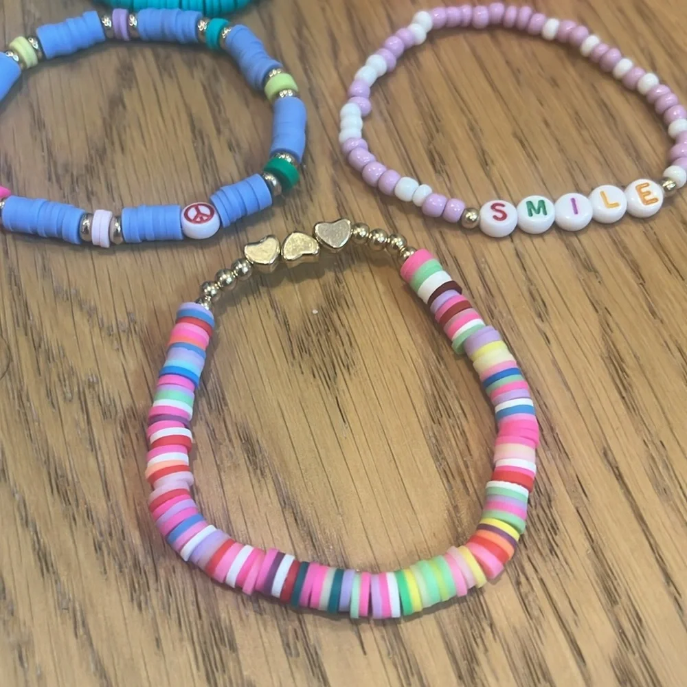 Cheerful set of brightly colored‎ beaded elastic friendship bracelets